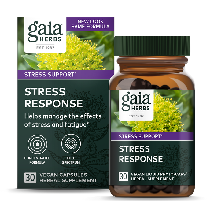 A bottle and box of Gaia Herbs Stress Response vegan liquid phyto-caps, labeled for stress support with 30 capsules, featuring a green and purple design and an image of a yellow flowering herb.