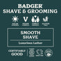 Badger Balm Shave Bar - Smooth & Moisturize product label featuring icons for solar powered, vegan, family friendly, gluten free, smooth shave, luxurious lather, cruelty free, B corporation, and organic ingredients. Enjoy a moisturizing shaving soap bar that’s plastic-free and crafted to deliver a smooth and luxurious grooming experience.
