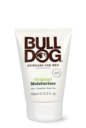 A white tube of Bulldog Original Moisturizer for men, featuring brown and green text. The label mentions aloe, camelina, and green tea, and the tube contains 100ml (3.3 fl oz) of product.