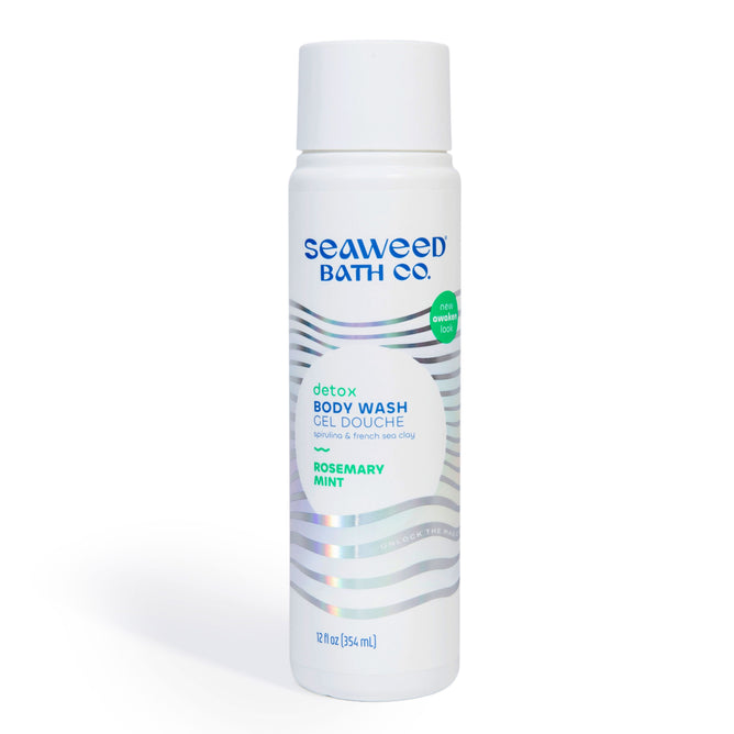 A white bottle of Seaweed Bath Co. Detox Body Wash in Rosemary Mint scent, with silver wavy lines, blue and green text, and a white cap. The bottle is 12 fl oz (355 mL).