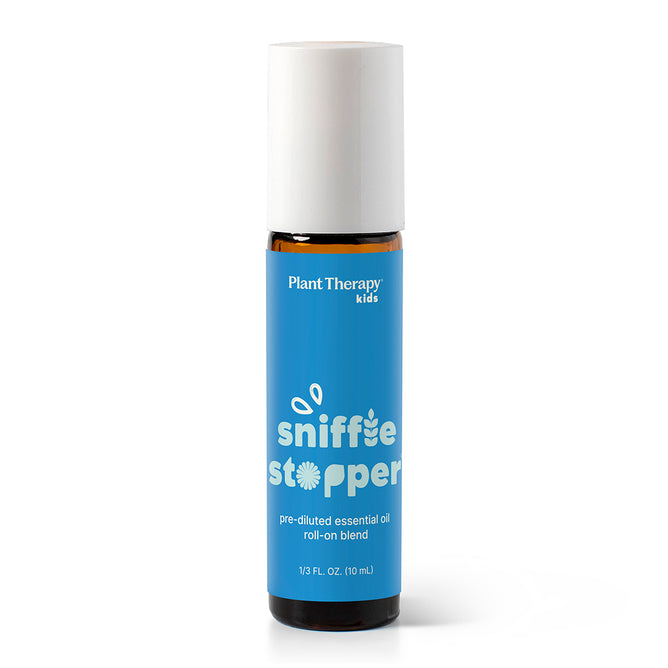 A 10 ml (0.33 fl oz) amber bottle of Plant Therapy Sniffle Stopper Roll-On - Pre-Diluted Essential Oil Blend, featuring a white cap and blue label, is perfect for gentle respiratory support to help clear congestion in children.