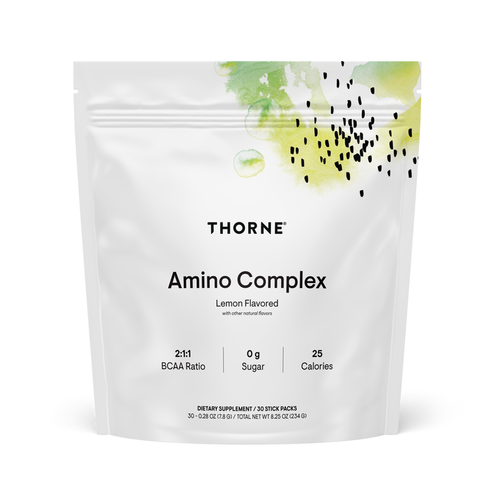 A white pouch of Thorne Amino Complex, Lemon Flavored, features artistic green and black splashes, a 2:1:1 BCAA ratio, 0g sugar, 25 calories, and 30 stick packs to help support muscle strength and lean muscle mass.