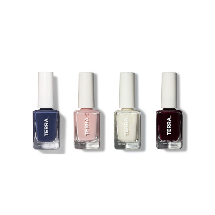 Four Terra nail polish bottles are lined up side by side. The colors from left to right are navy blue, light pink, off-white, and deep burgundy, each with a white cap and shadow cast on a white background.
