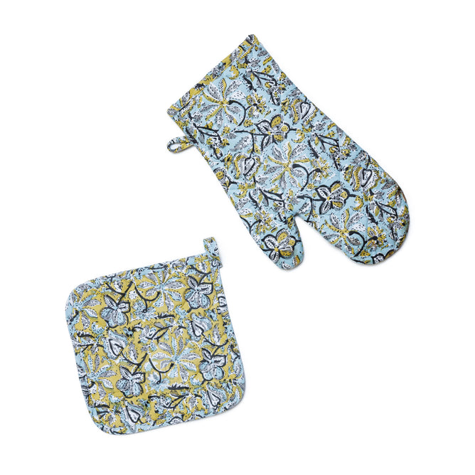 The Supra Endura Hand Block Printed Ovenmitt And Pot Holder Set is shown on a white background, featuring blue, yellow, and black floral designs.