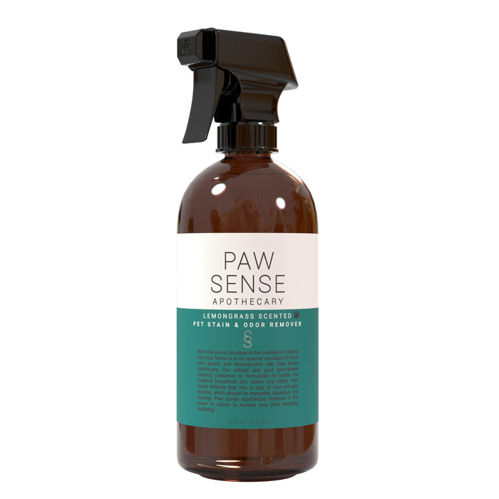 A brown spray bottle labeled Paw Sense Apothecary with Lemongrass Scented Pet Stain & Odor Remover on a white and teal label, featuring a black spray nozzle, against a white background.