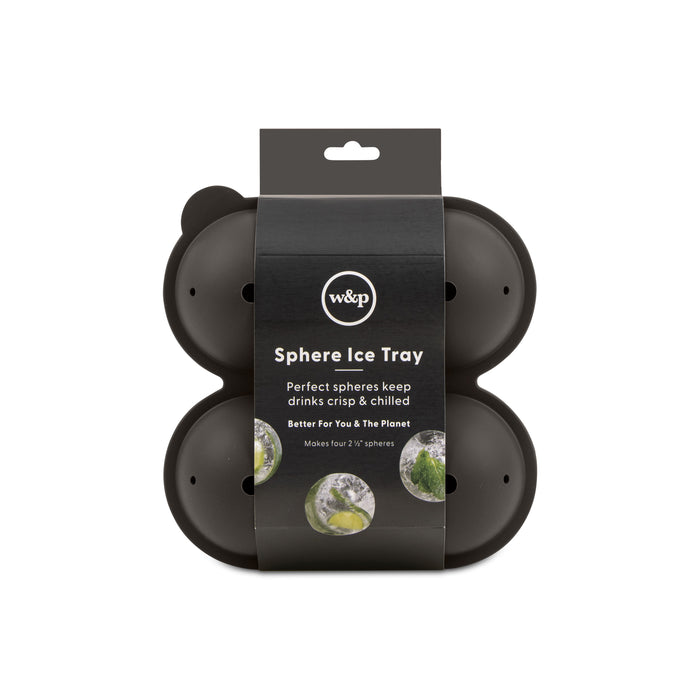A black sphere ice tray in packaging labeled Sphere Ice Tray by W&P, designed to make four 2.5-inch ice spheres. The packaging highlights that perfect spheres keep drinks crisp and chilled.
