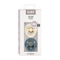 A package of BIBS Colour Pacifiers, size 1, containing two round pacifiers in cream and blue colors. The packaging is white with pink accents and has a clear window displaying the pacifiers inside.
