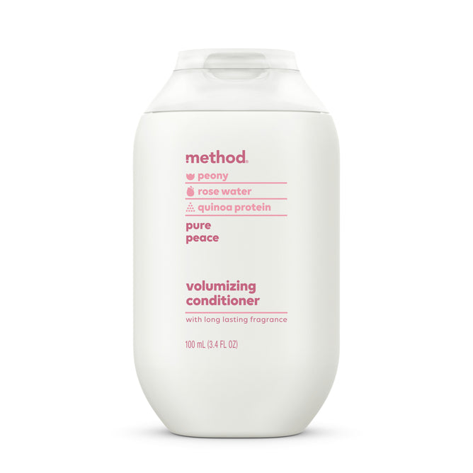 A white bottle of Method Volumizing Conditioner with pink text listing ingredients like peony, rose water, and quinoa protein; the scent is Pure Peace and the bottle contains 100 mL (3.4 fl oz).