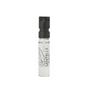 A small, clear spray vial of SANTELLE Eau de Parfum with a black cap and Opacity SANTELLE text printed on the bottle, shown against a white background.