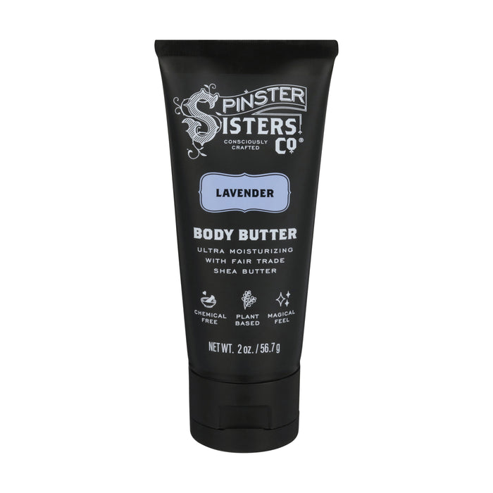 A black tube of Spinster Sisters Co. Lavender Body Butter, featuring Ultra Moisturizing with Fair Trade Shea Butter and icons for chemical free, plant based, and magical feeling. Net weight is 2 oz.
