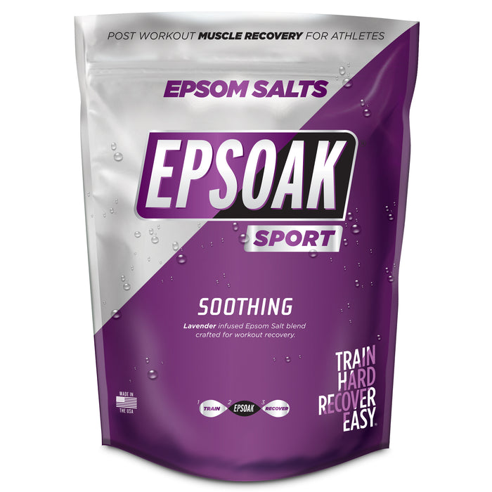 A purple and white resealable pouch labeled EPSOAK Sport Epsom salts for muscle recovery, featuring lavender and Epsom salt blend. The packaging also says Train Hard. Recover Easy. and Soothing at the front.