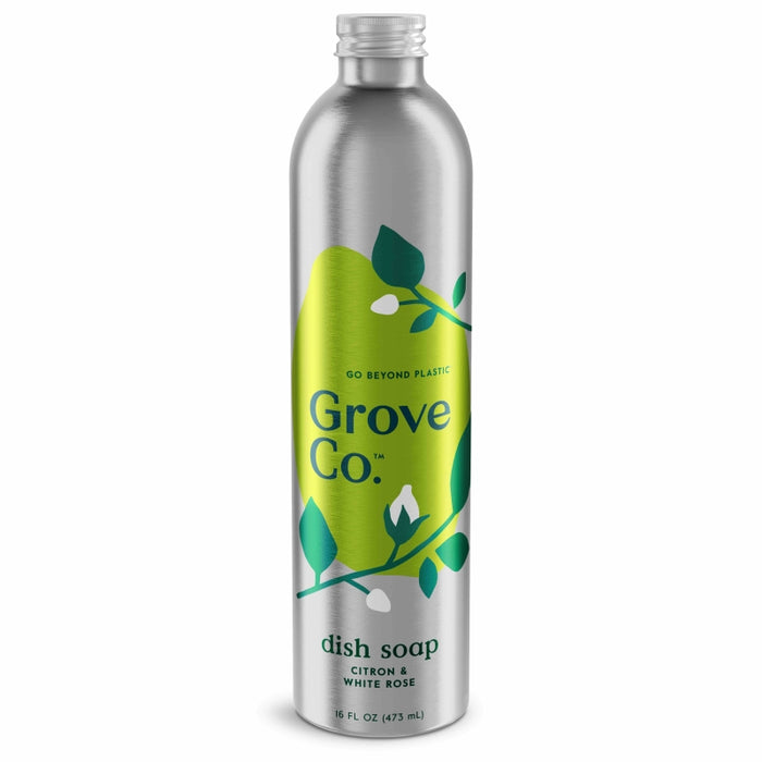 A silver aluminum bottle of Grove Co. dish soap with green and blue leaf graphics. The label reads Go Beyond Plastic, Citron & White Rose, and the bottle size is 16 fl oz (473 mL).