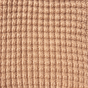 Close-up of The Popcorn - Henna, a warm-toned tan superfine merino baby blanket featuring a vertical ribbed and textured knit pattern.