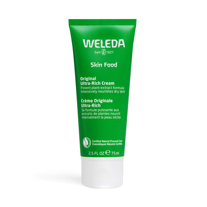 A green tube of Weleda Skin Food Original Ultra-Rich Cream, 2.5 fl oz (75 ml), featuring English and French text and a white cap, standing upright on a white background.