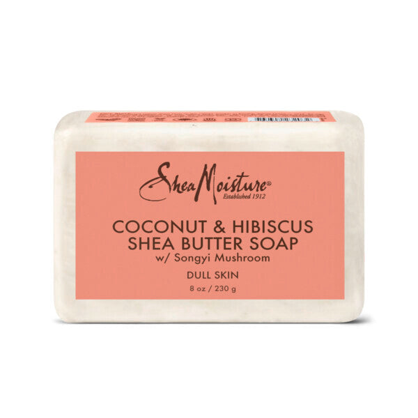 A bar of SheaMoisture Coconut & Hibiscus Shea Butter Soap with Songyi Mushroom for dull skin, 8 oz (230 g), wrapped in white packaging with a coral label displaying the product details.
