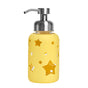 The Grove Co. Kids Foaming Hand Soap Glass Dispenser is a yellow container with star-shaped cutouts that reveal the transparent interior and features a stainless steel pump. This reusable dispenser reduces plastic waste and adds charm to any space.
