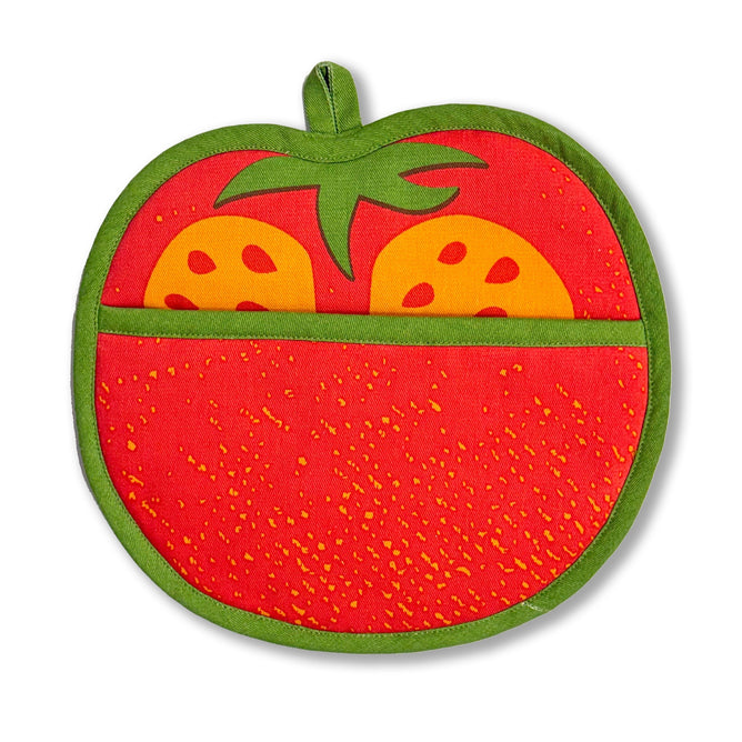 The Neighborgoods Pot Holder - Tomato: a red and green cotton pot holder shaped like a tomato, with a handy pocket and two yellow tomato slice details—an adorable kitchen essential.