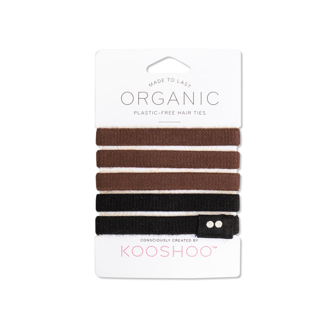 A white card displays six organic, plastic-free hair ties in brown and black shades, with the brand name KOOSHOO printed at the bottom.