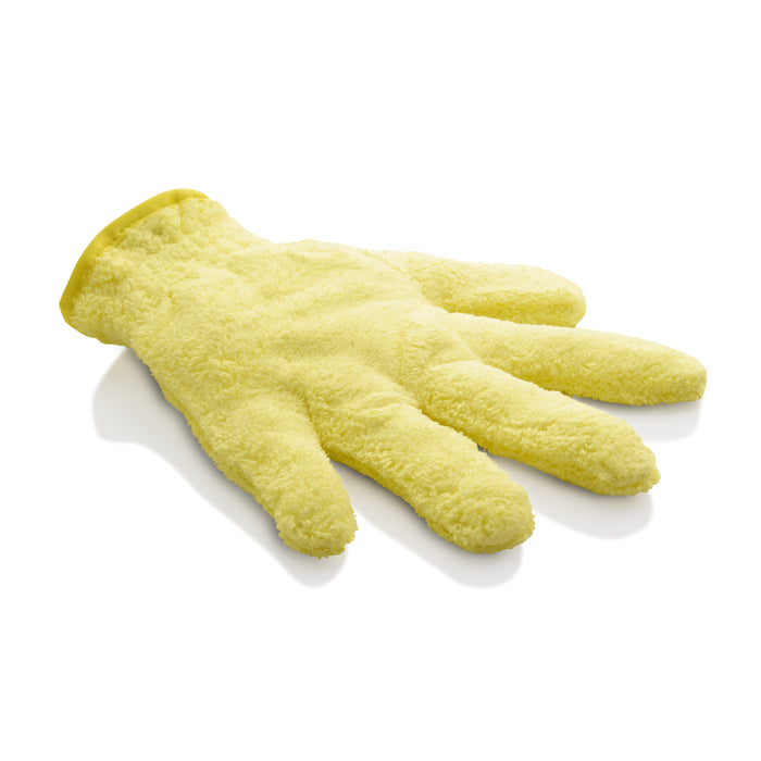 A yellow cleaning glove made of soft, textured fabric is lying flat on a white surface with its fingers slightly curved.