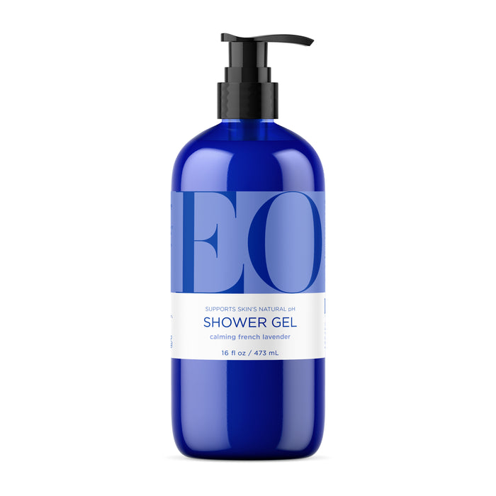 A blue bottle with a black pump labeled EO Shower Gel, calming French lavender, 16 fl oz / 473 mL. The bottle has large light blue letters EO and a white label.