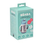 A turquoise and white box for a Béaba stainless steel straw cup for children, featuring product images and information in French and English. The cup is for ages 8 months and up and holds 250 ml (8 fl oz).