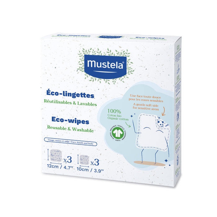 A box of Mustela Eco-wipes, labeled as reusable and washable, for sensitive areas. The packaging features green and blue text, a cartoon wipe character, and product size information: 12cm (4.7) x 10cm (3.9), 3 wipes.
