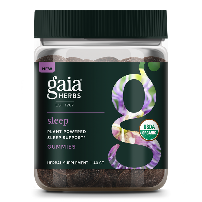 A jar of Gaia Herbs Sleep Gummies, labeled as plant-powered sleep support, USDA organic, and containing 40 herbal supplement gummies. The label features a purple and green design with lavender imagery.