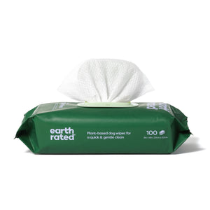 A green package of Earth Rateds hypoallergenic Large Dog Grooming Wipes, ideal for natural pet care, features an open top with a visible wipe. This plant-based option includes 100 wipes, each 8 inches square.
