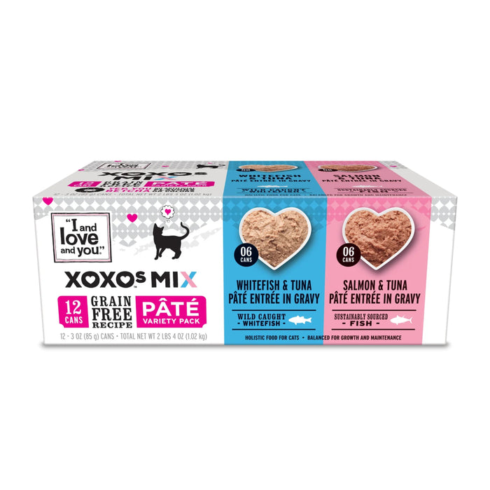 A 12-can variety pack of I and love and you XOXOs Mix grain-free pâté cat food, featuring whitefish & tuna and salmon & tuna entrées in gravy; packaging shows heart-shaped images of the food.