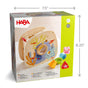 HABA Underwater World Wooden Shaper Sorter Toy featuring an underwater theme, decorated with aquatic illustrations, a central mirror, and colorful geometric pieces, shown in its packaging.