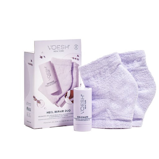 The VOESH New York Heel Repair Duo Lavender includes a Solemate bottle and soft lavender Moisturizing Heel Socks, all beautifully packaged in a branded box.