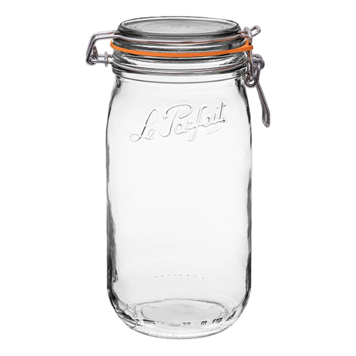 A clear glass jar with an orange rubber seal, metal clasp, and the words Le Parfait embossed on the front. The jar is empty and standing upright against a white background.