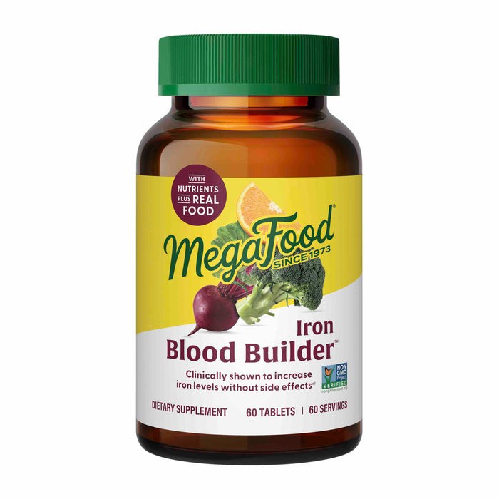 A bottle of MegaFood Iron Blood Builder dietary supplement with 60 tablets, featuring images of an orange slice, beet, and broccoli on the label. The label highlights “Nutrients Plus Real Food” and “Non-GMO Project Verified.”.