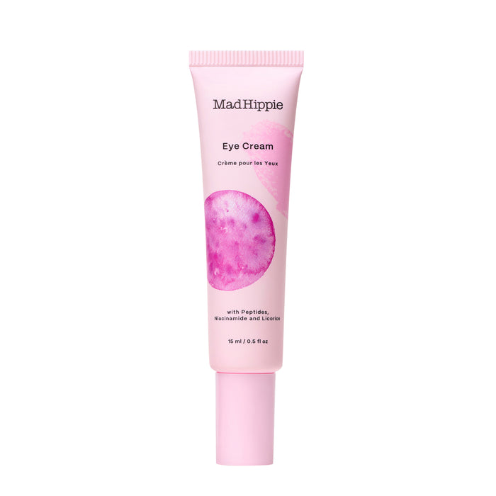 A pink tube of Mad Hippie Eye Cream with a circular purple design, labeled Eye Cream and with Peptides, Niacinamide and Licorice, 15 ml (0.5 fl oz).