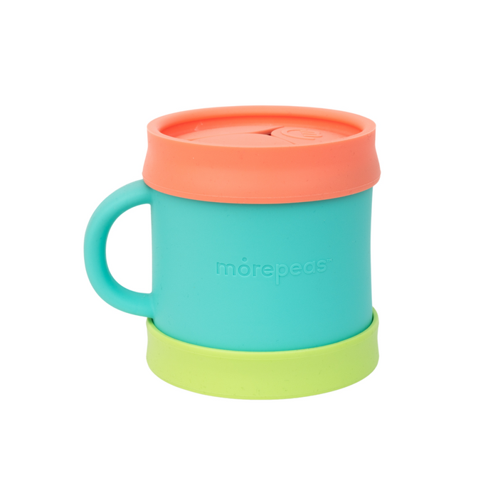 A turquoise mug with a handle, featuring an orange lid and a light green removable base. The word morepeas is embossed on the side. The background is plain white.