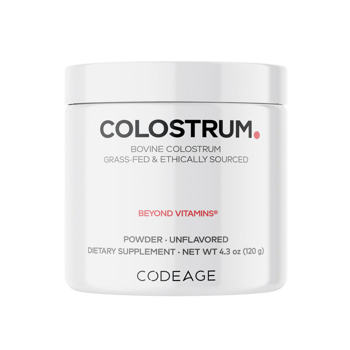 A white jar labeled COLOSTRUM with details including Bovine Colostrum, Grass-Fed & Ethically Sourced, Beyond Vitamins, Powder, Unflavored, and Net Wt 4.3 oz (120 g) by Codeage.