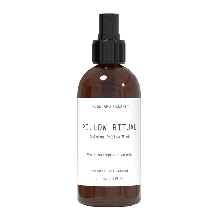 A brown spray bottle labeled Muse Apothecary Pillow Ritual Calming Pillow Mist with aloe, eucalyptus, and lavender. The bottle holds 8 fl oz (236 ml) and has a black spray cap.