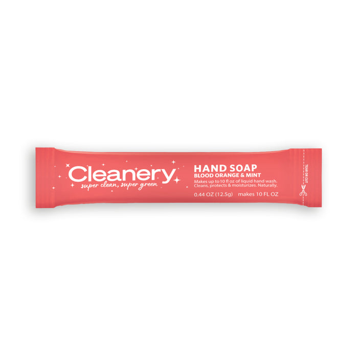 A single-use packet of Cleanery hand soap in blood orange & mint scent. The packet is red with white text and details, indicating it makes 10 fl oz of soap and weighs 0.44 oz (12.5 g).