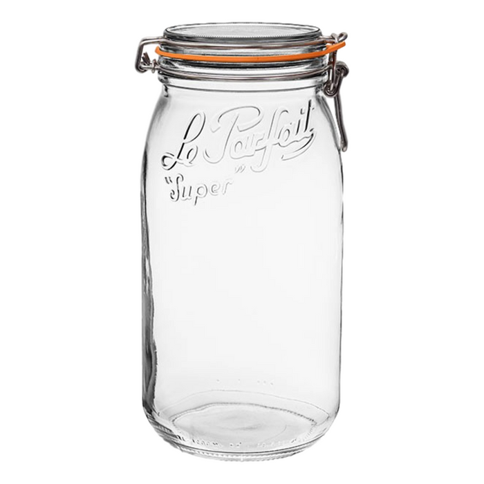 A clear glass jar with a metal clasp and an orange rubber seal, embossed with the words Le Parfait Super on the front. The jar is empty and standing upright against a white background.