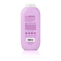 The image shows the back view of a method body wash bottle, showcasing a pink design with cruelty-free labeling, product details, and usage instructions in white and dark pink text. The bottle has a barcode and features a white cap.