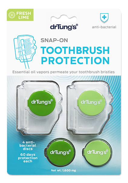 A package of drTungs Snap-On Toothbrush Protection in Fresh Lime flavor, featuring four green antibacterial discs in plastic holders, with text highlighting 60 days of protection for oral care.