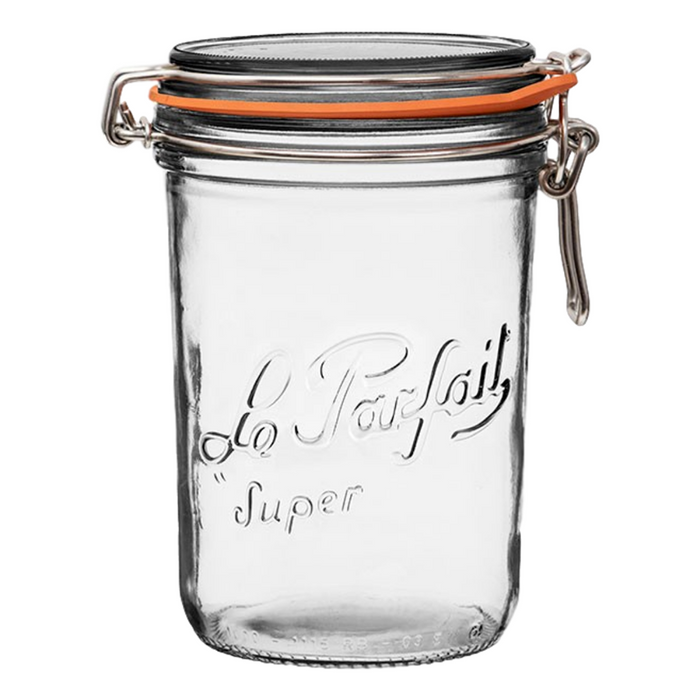 A clear glass jar with a hinged, airtight lid, orange rubber seal, and metal clasp. The jar is embossed with the words “Le Parfait Super” on the front. The jar is empty and standing upright.