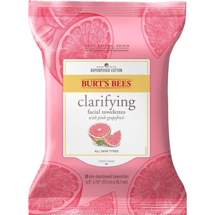 A pink package of Burt’s Bees Clarifying Facial Towelettes with Pink Grapefruit, featuring grapefruit illustrations and text indicating it is for all skin types and made with repurposed cotton.