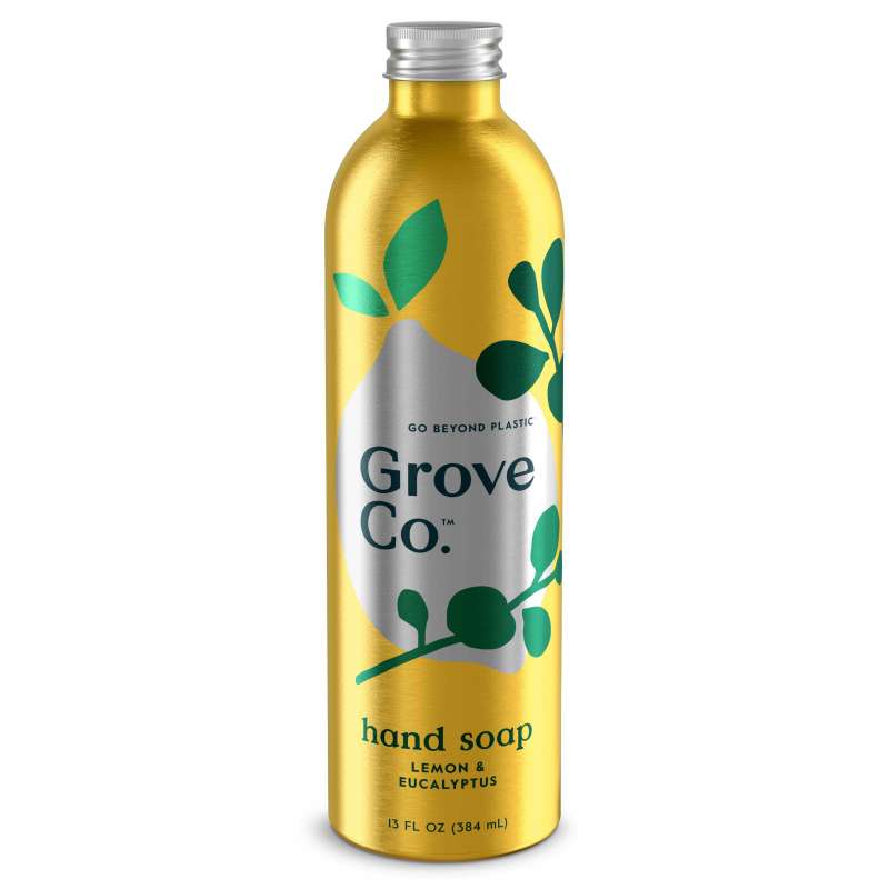 A Grove Co. Hydrating Hand Soap Refill in a gold recyclable aluminum bottle labeled Go Beyond Plastic with a green leaf design. Its lemon and eucalyptus scented, plant-based, and holds 13 fl oz (384 mL).