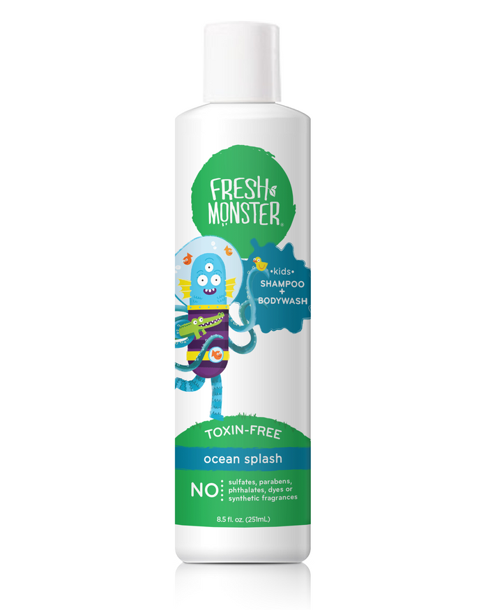 A white bottle of Fresh Monster kids shampoo and body wash, ocean splash scent, featuring a playful blue octopus cartoon on the label. The bottle highlights it is toxin-free and contains no sulfates, parabens, or synthetic fragrances.