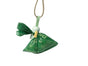 A green dog waste bag tied and clipped to a beige leash with a plastic clip and dispenser, isolated on a white background.