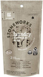 The image displays a pack of Stoneworks Laundry Detergent Pods - Sample by grab green, featuring a birch branch scent. Key features include fragrance release, stain fighting, and odor elimination. Made with non-toxic ingredients, it effectively handles two loads.