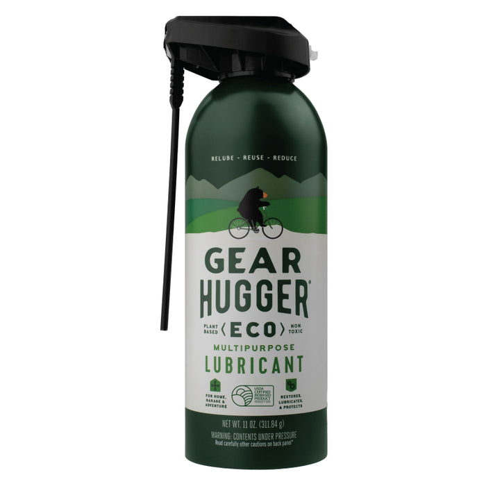 A green and white can of Gear Hugger Eco Multipurpose Lubricant with a spray nozzle, featuring a graphic of a person riding a bicycle and the words Relube • Reuse • Reduce on the label.