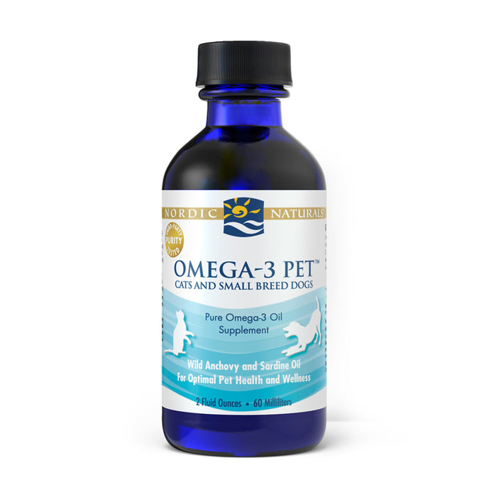 A blue bottle labeled Omega-3 Pet by Nordic Naturals for cats and small breed dogs. The label mentions it is a pure omega-3 oil supplement containing wild anchovy and sardine oil for pet health and wellness.