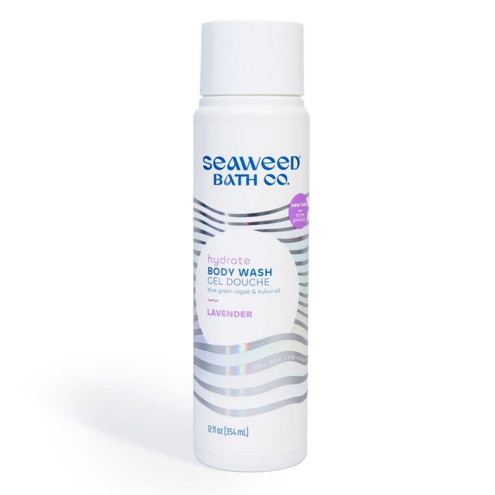 A white bottle of Seaweed Bath Co. Hydrate Body Wash in Lavender scent, featuring silver wavy lines and blue and purple text. The bottle is 12 fl oz (354 mL) and designed for hydration.